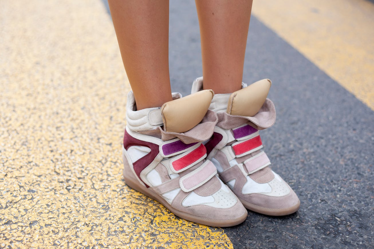 PARIS - MARCH 02:  Rea Papathanasiou, blogger  wearing Isabel Marant trainers  at Paris Fashion Week...